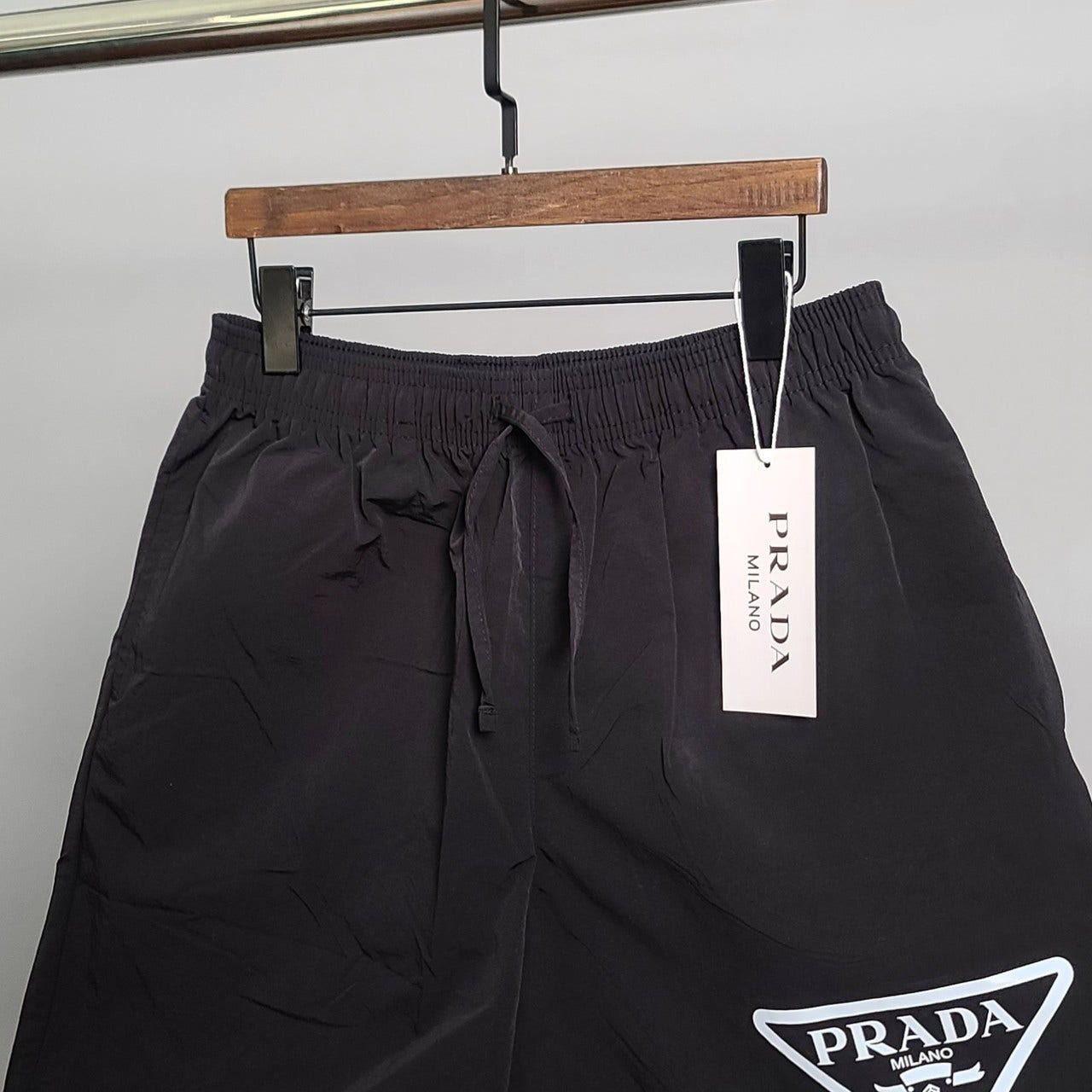 프라다-하의-국내배송 삼각프린팅 나일론 5부 팬츠