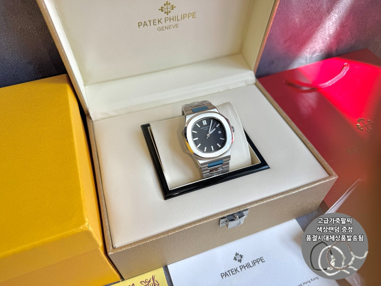파텍필립-시계-국내배송 노틸러스 은장 블랙다이얼 40mm 한정판